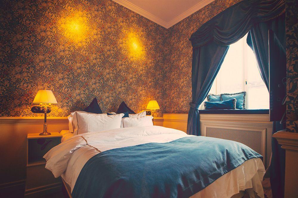 Hotel Pigalle Göteborg Exteriér fotografie A bedroom at the hotel